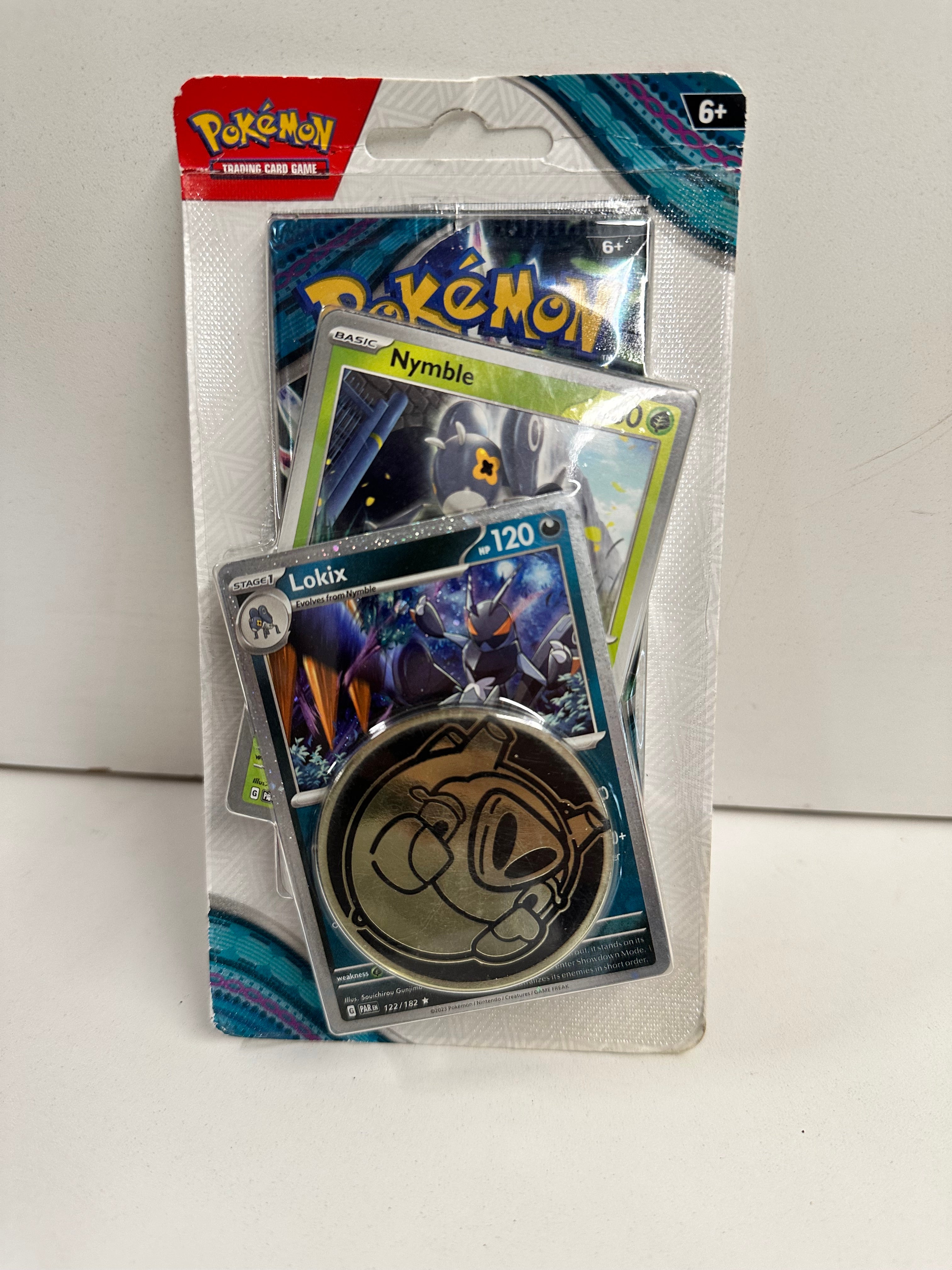 Pokemon Lokix/Nymble Twilight Masquerade Blister Pack + Coin