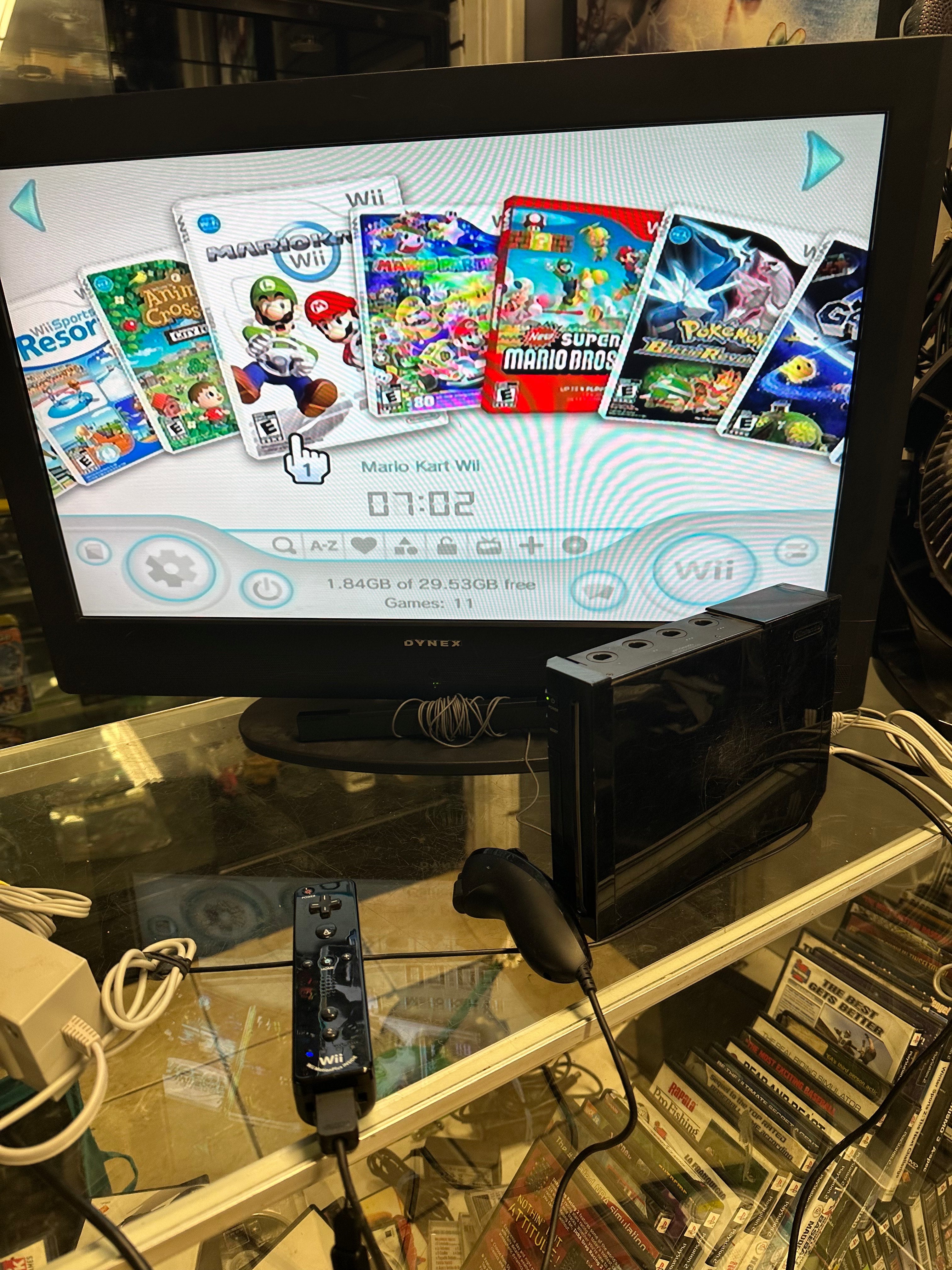 Jailbroken Black Wii with 11 Rare Valuable Wii Games & 8 Rare Valuable Game Cube Games